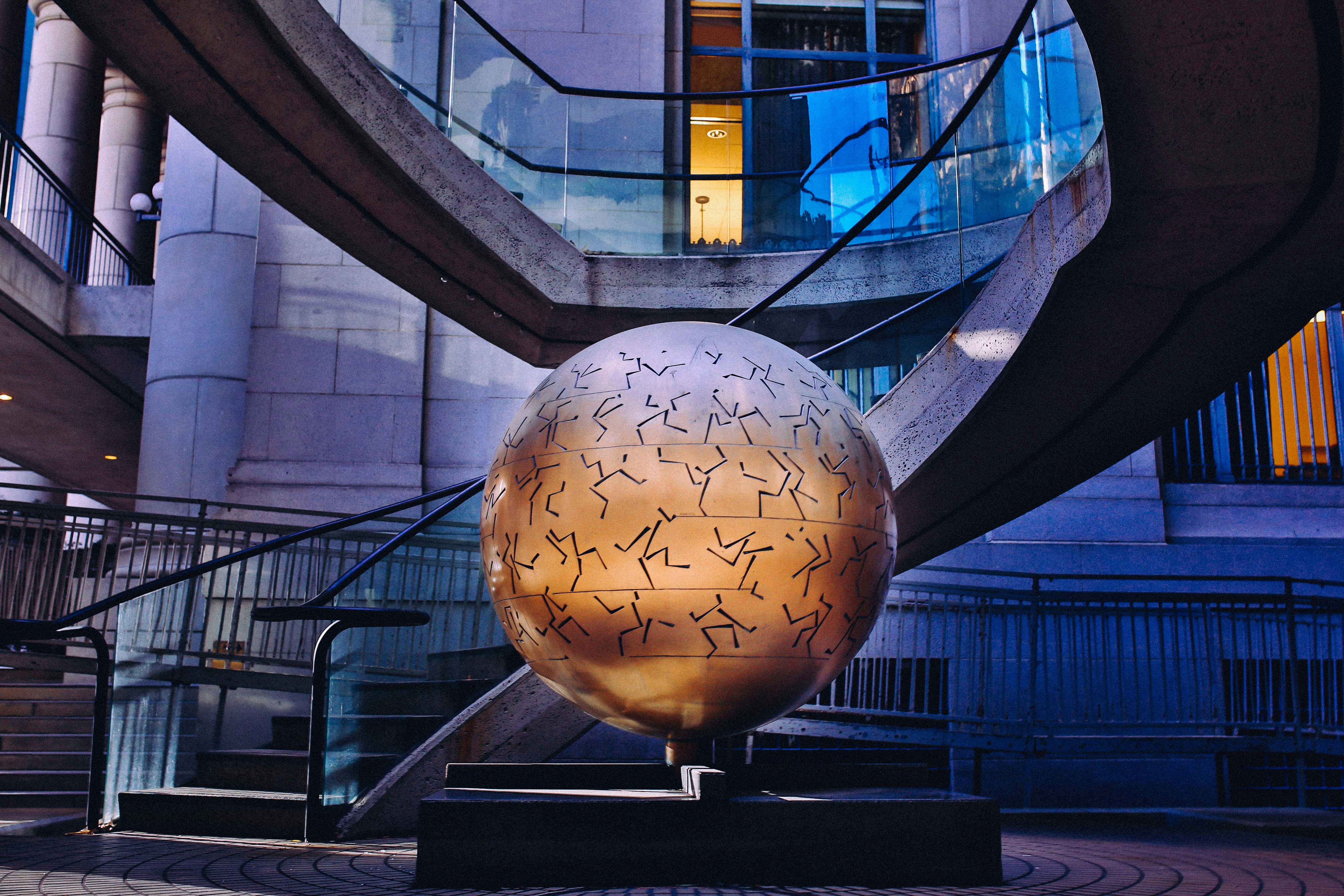 globe statue inside building